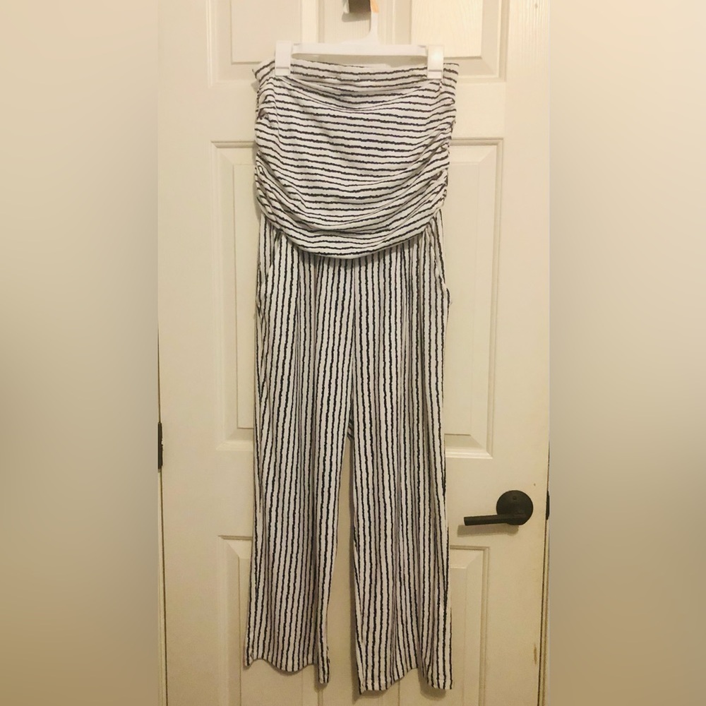 Sleeveless black and white striped jumpsuit